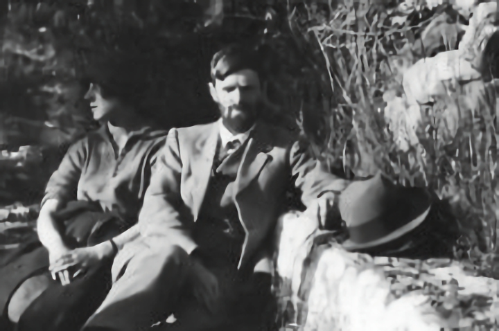 DH Lawrence sitting with Frieda